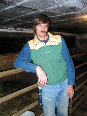Farmer inside a barn