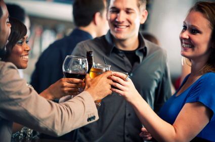 people drinking at a bar